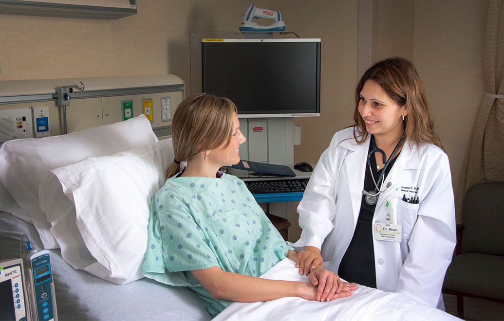 Doctor meeting with a patient.